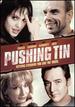 Pushing Tin