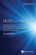 Light and Vacuum: the Wave-Particle Nature of the Light and the Quantum Vacuum. Electromagnetic Theory and Quantum Electrodynamics Beyond the Standard Model