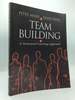 Team Building: a Structured Learning Approach